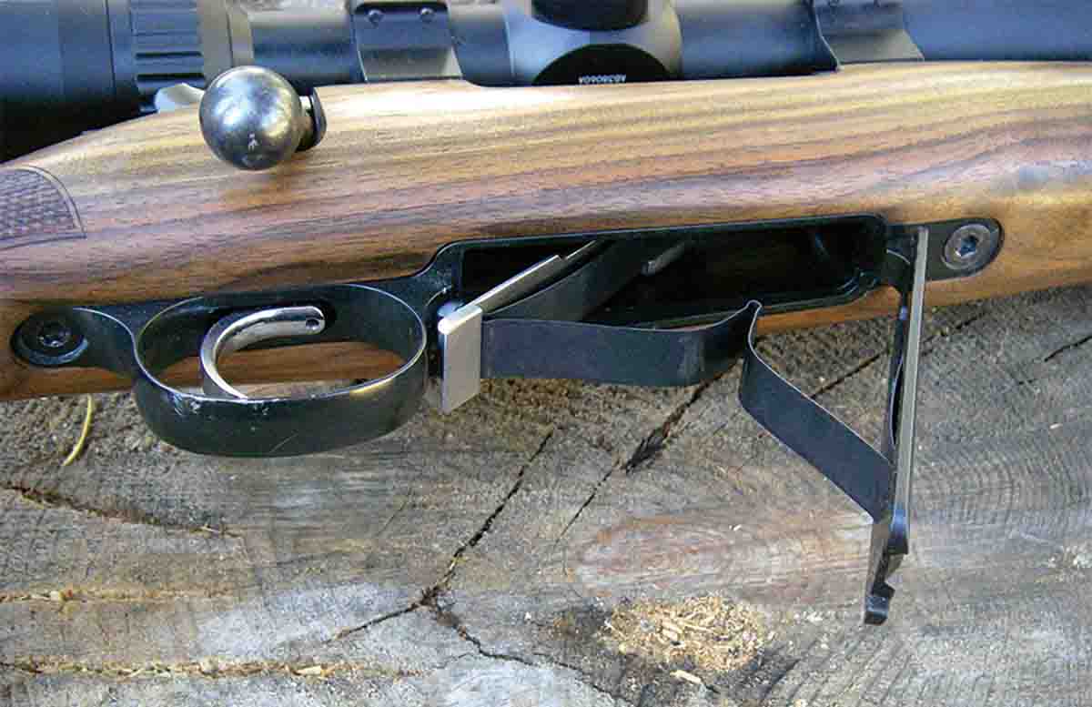 The floorplate is hinged and houses two guard screws.